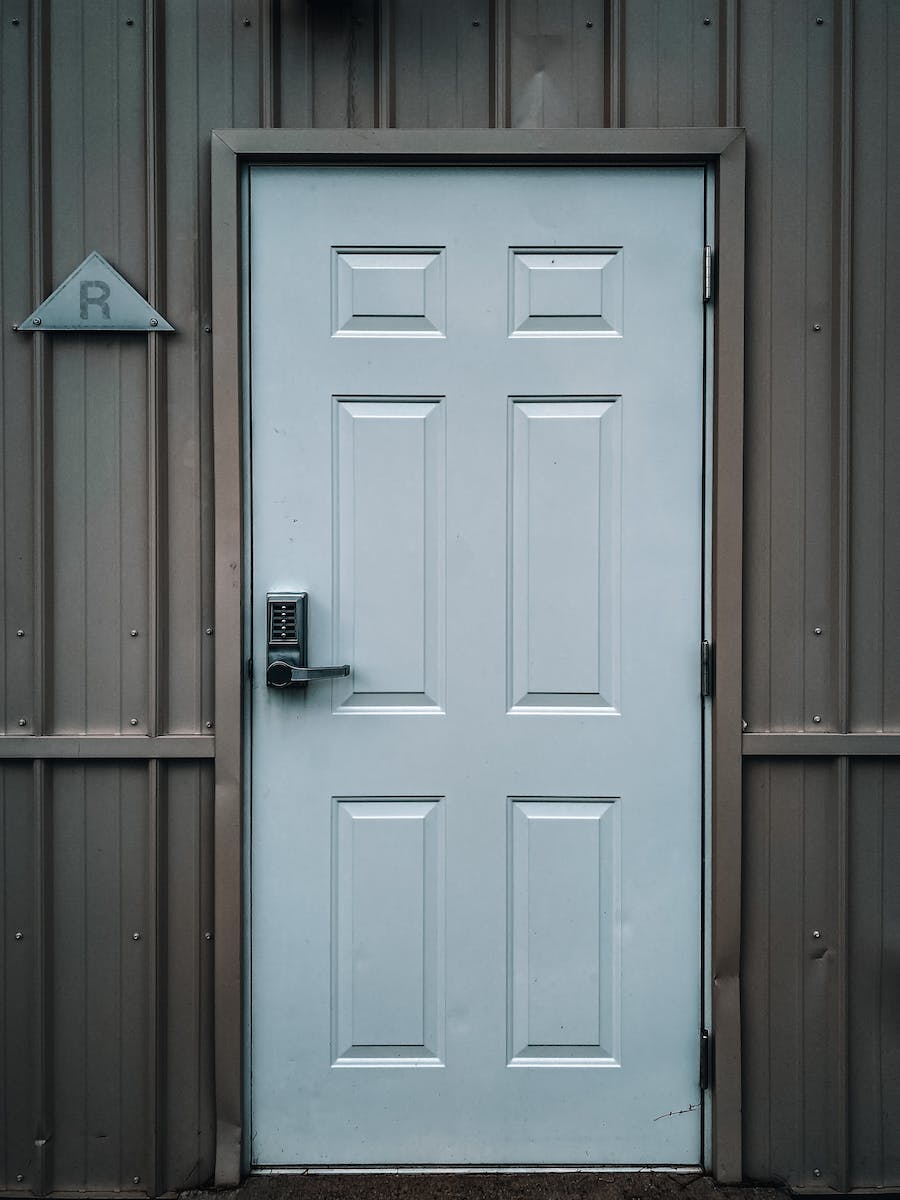 White door with modern lock